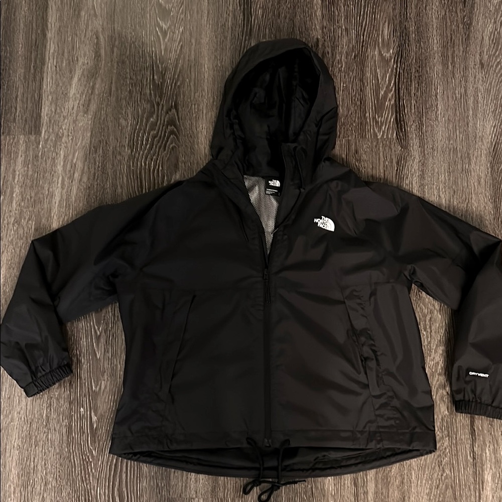 The North Face black hooded raincoat
